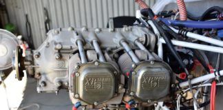 The Superior IO-360 engine stripped and ready for cylinder removal. Note that oil return lines are capped as are the intake tubes in the sump. Until the decision has been made to completely tear down the engine it is best to protect everything as you go.